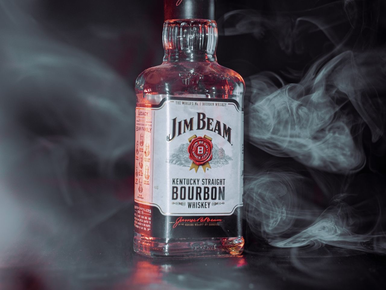 a bottle of bourbon sitting on top of a table